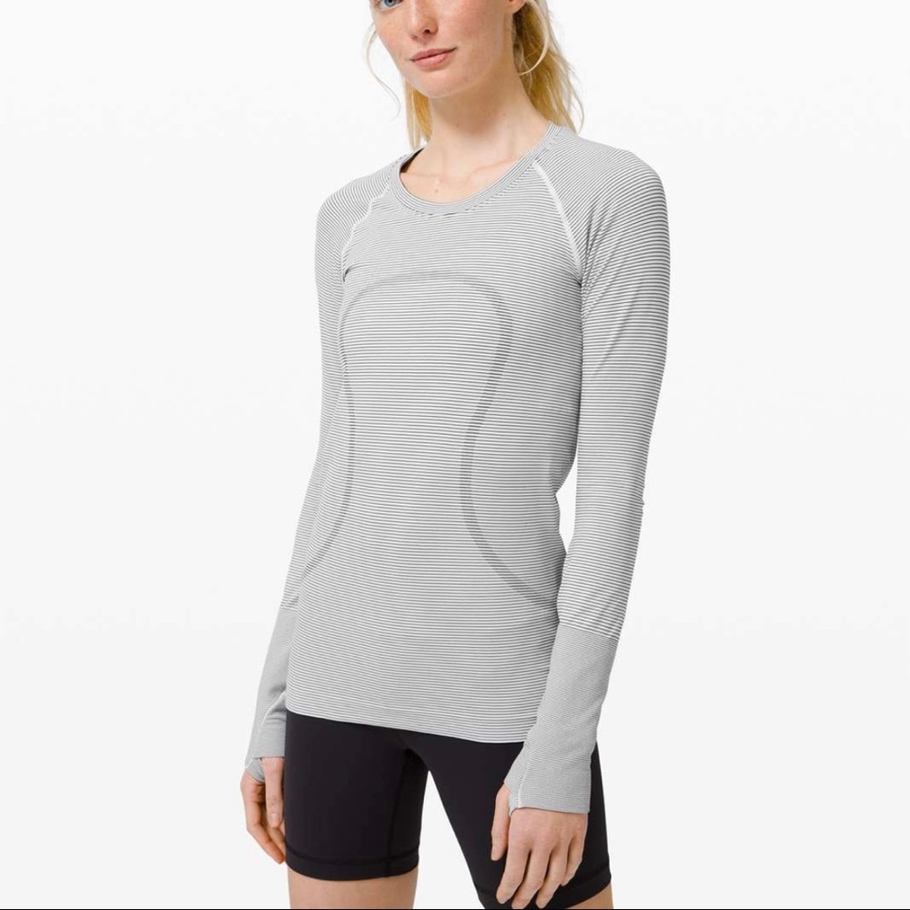 Size 12 Swiftly Tech long sleeve! Never worn. Grey and white striped pattern.